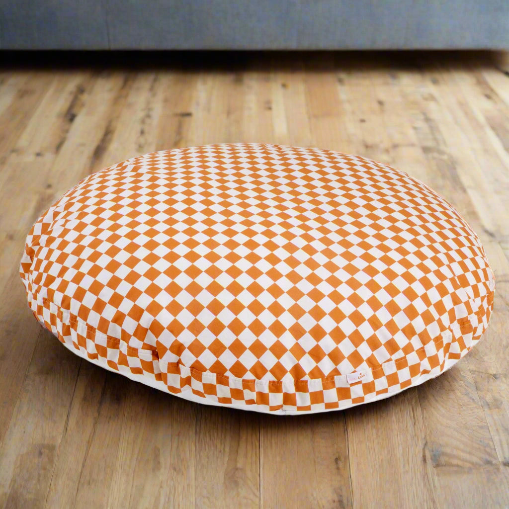 Large floor cushion with orange and white chequered designed