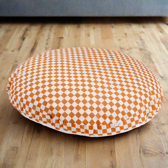 Large floor cushion with orange and white chequered designed