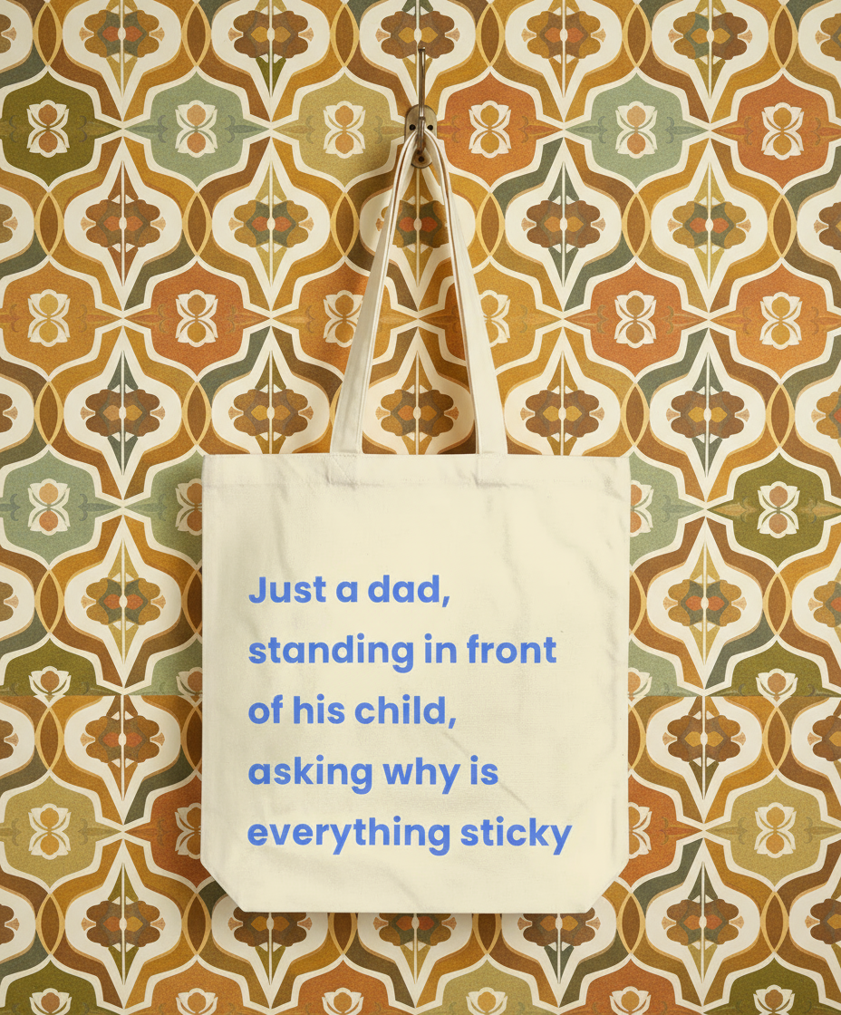Tote bag with humorous text on a patterned wall background