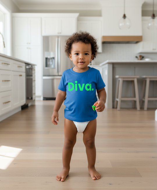 Child wearing a blue shirt with 'Diva' on it in a kitchen