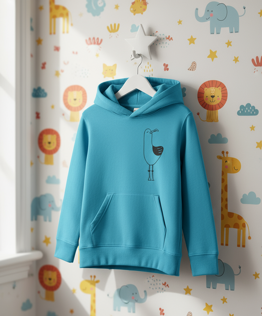 Blue hoodie on a hanger against a colorful children's room wallpaper.