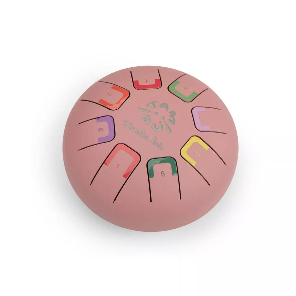 Pink metal tongue drum instrument with coloured metal notes